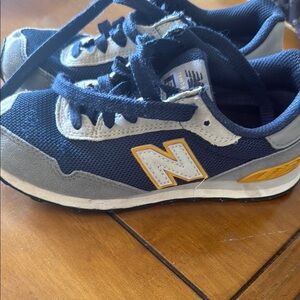 New Balance Kids Navy and Gray Sneakers with Yellow Accents youth 1